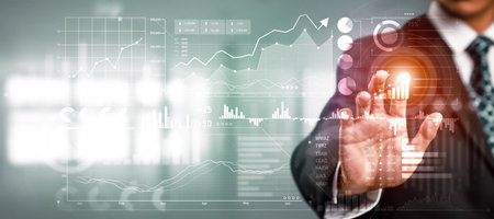 Businessman analyst working with digital finance business data graph showing technology of...