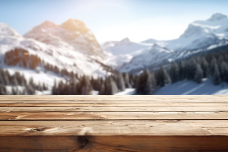 The empty wooden table top with blur background of Alpine with snow capped. Exuberant image.の写真素材