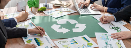 Group of business people planning and discussing on recycle reduce reuse policy symbol in office...