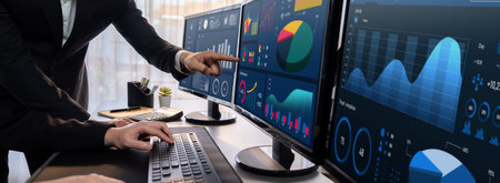Analyst working on data analysis or BI dashboard on computer monitor. Business team analyzing...