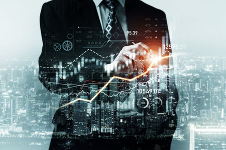 Businessman analyst working with digital finance business data graph showing technology of investment strategy for perceptive financial business decision. Digital economic analysis technology concept.の写真素材