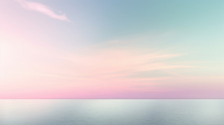 Clear blue sky sunset with glowing pink and purple horizon on calm ocean seascape background. Picturesqueの写真素材