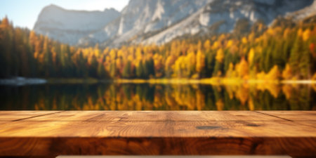The empty wooden table top with blur background of lake and mountain in autumn. Exuberant image.