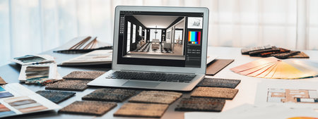 Interior designer workspace table and architecture software on laptop screen with mood board materials and colorful swatch color for color selection. Modern interior design office. Insightの写真素材