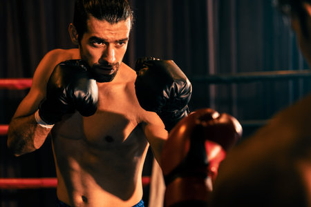 Two athletic and muscular body boxers face off in fierce boxing match. Boxing fighter competitor...
