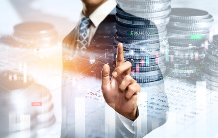 Businessman analyst working with digital finance business data graph showing technology of investment strategy for perceptive financial business decision. Digital economic analysis technology concept.の写真素材