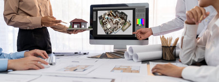 Group of interior architect designer discussing together on blueprint and laptop screen display architecture software for more precise designing layout. Modern home design and renovation. Insightの写真素材