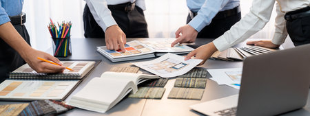 Group of professional interior designer and architect working together, planning and choosing color samples in office for house design or renovation. Insightの写真素材