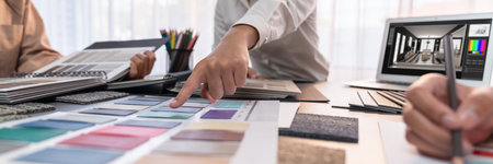 Group of professional interior designer and architect working together, planning and choosing color...