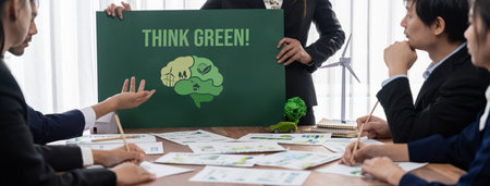 Green business company meeting on environmental awareness and ecological protection regulation implementing to reduce CO2 emission and save Earth as responsible and eco-friendly company. Trailblazingの写真素材