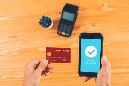 Fast and secure transactions using QR code technology on mobile banking app, enabling seamless cashless payments via barcode scanning for modern shopping lifestyle with smartphone application. Entityの写真素材