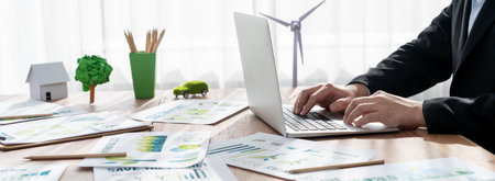 Eco business company office, businessman using laptop to plan business strategic marketing of...