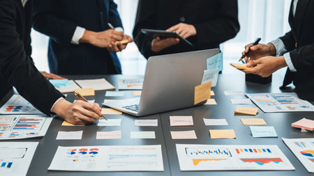 Analyst team use sticky note and laptop for financial insight with business Fintech paper for data analysis dashboard. Creative and analytic brainstorming for business marketing strategy idea. Prodigyの写真素材