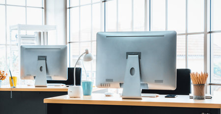 Desktop PC computers in small modern office or home office. Trendy workplace interior. Jivyの写真素材