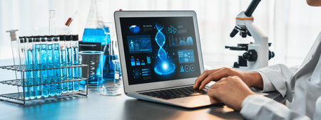 Scientist working on advance biotechnology computer software to study or analyze DNA data after making scientific breakthrough from chemical experiment on medical laboratory. Neotericの写真素材