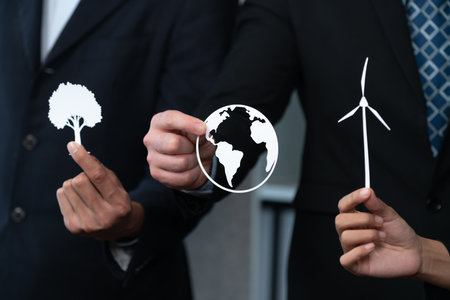 Group of business people holding alternative net zero energy icon for greener sustainable Earth with renewable energy technology to reduce CO2 emission. Quaintの写真素材