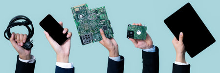 Panoramic banner hand holding electronic waste on isolated background. Eco-business recycle waste policy in corporate responsibility. Reuse, reduce and recycle for sustainability environment. Quaintの写真素材