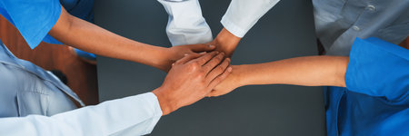 Group of medical staff doctor nurse and healthcare specialist profession forming synergy hand in...
