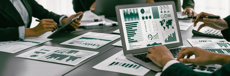 Panorama shot analyst team utilizing BI Fintech to analyze financial report with laptop....