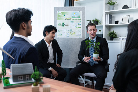Businessman leader give presentation on corporate social responsibility with reforestation in order...