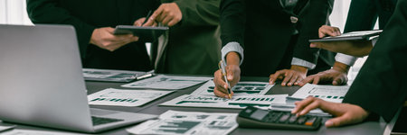 Panoramic shot business people analyze dashboard paper and financial report use calculator...