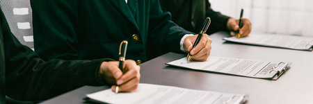 Panorama view of corporate executives sign joint business contract in boardroom, negotiating partnership agreement for collaboration. Professional agreement between big corporations. Prodigyの写真素材