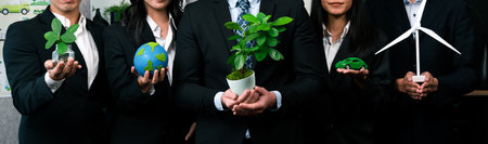 Panoramic view of business people promoting environmental campaign to reduce CO2 emission and save planet from global warming using renewable clean energy and eco-friendly sustainable power. Quaintの写真素材