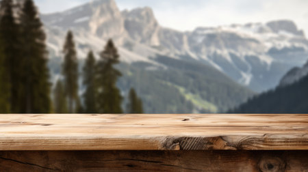 The empty wooden brown table top with blur background of dolomite mountain. Exuberant image.の写真素材
