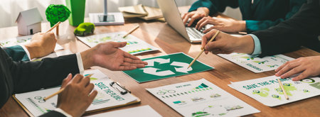 Group of business people planning and discussing on recycle reduce reuse policy symbol in office meeting room. Green business company with eco-friendly waste management regulation concept.Trailblazingの写真素材