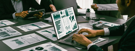 Panorama shot analyst team utilizing BI Fintech to analyze financial report with laptop....