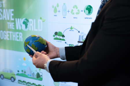 Businessman leader give presentation on eco-friendly implementation in order to reduce CO2 emission and make sustainable ecology for greener future with corporate environmental regulation. Quaintの写真素材