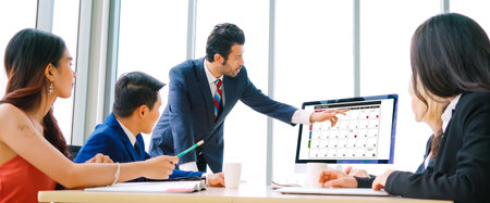 Calendar on computer software application for modish schedule planning for personal organizer and online businessの写真素材