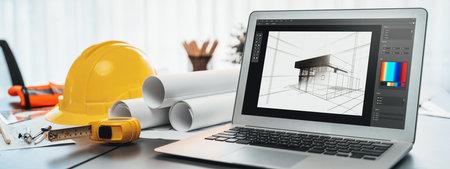 Digital blueprint by architecture design software on laptop screen with documents and blueprint layout on office table seamless integration of technology and traditional drafting method. Insightの写真素材