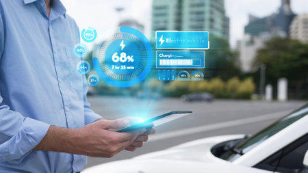 Modern businessman check battery status from smartphone mobile 3D hologram while his EV car...