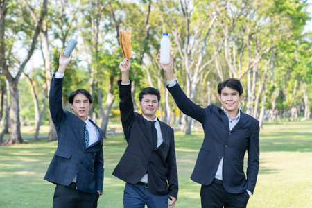 Cleaning day concept, corporate volunteer with eco business people cleaning forest with waste management to recycle for sustainable clean environment with recycling and ESG principle. Gyreの写真素材