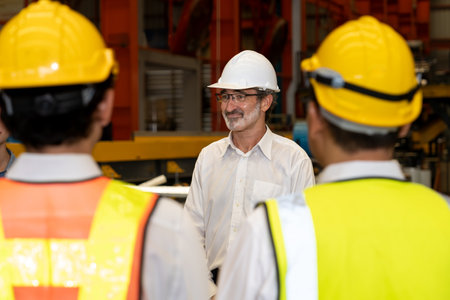 Collective factory worker and engineer gather for meeting with factory executive or manager,...
