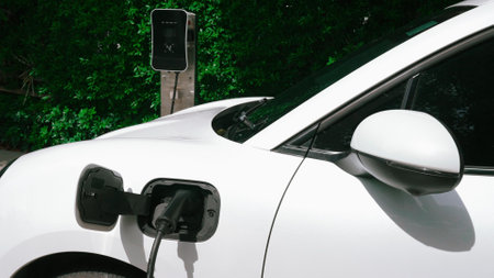 Progressive sustainability of energy concept by electric car parking and recharging next to home...