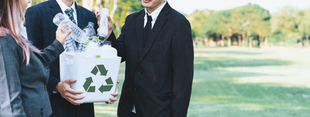Cleaning day concept, corporate volunteer with eco business people cleaning forest with waste management to recycle for sustainable clean environment with recycling and ESG principle. Panorama Gyreの写真素材