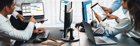 Project management team coordinating and update project planned schedule on computer using Gantt chart software in office. Business people planning time and deadline for company task. Trailblazingの写真素材