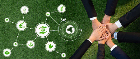 Business partnership join hand together with eco design icon symbolize ESG sustainable environment...