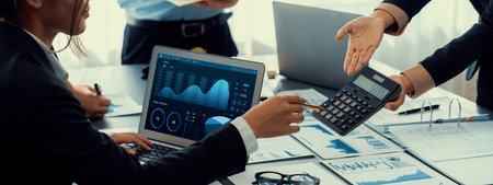 Business intelligence and data analysis concept. Analyst team working on financial data analysis...