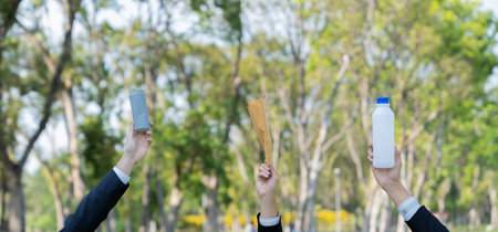 Cleaning day concept, corporate volunteer with eco business people cleaning forest with waste...