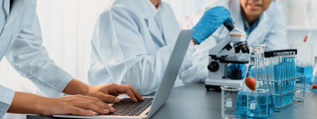 Group of dedicated scientist conduct chemical experiments and research in medical lab as groundbreaking developing for vaccine drug or antibiotic. Pharmaceutical and biochemistry laboratory. Neotericの写真素材