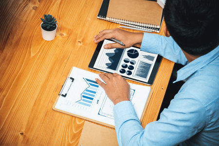 Financial data analysis dashboard by Fintech BI or business intelligence display on tablet screen to...