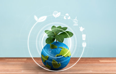 Eco world and green Earth day concept, Earth globe with young tree planted on top and eco-friendly design icon symbolize environmental protection and clean technology for sustainable future. Relianceの写真素材