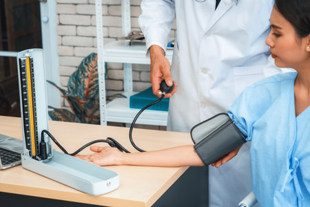 Doctor in professional uniform examining patient at hospital or medical clinic. Health care ,...