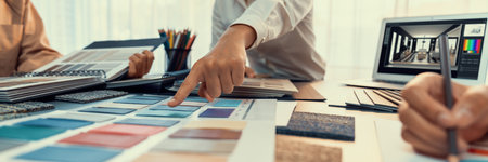 Group of professional interior designer and architect working together, planning and choosing color samples in office for house design or renovation. Insightの写真素材