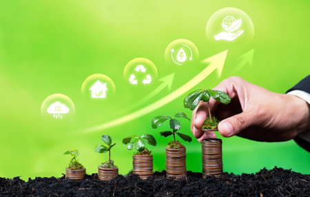 Stack of money growing with businessman investing in eco-friendly technology symbolize green...