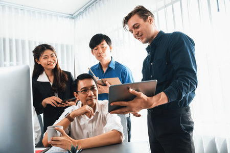 Group of diverse office worker employee working together on strategic business marketing planning in corporate office room. Positive teamwork in business workplace concept. Prudentの写真素材