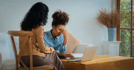 Sad PTSD woman patient in crucial therapy for mental health with psychologist, depression or grief...